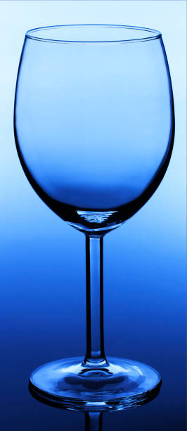 istock wine glass on dark blue background close up 860798326