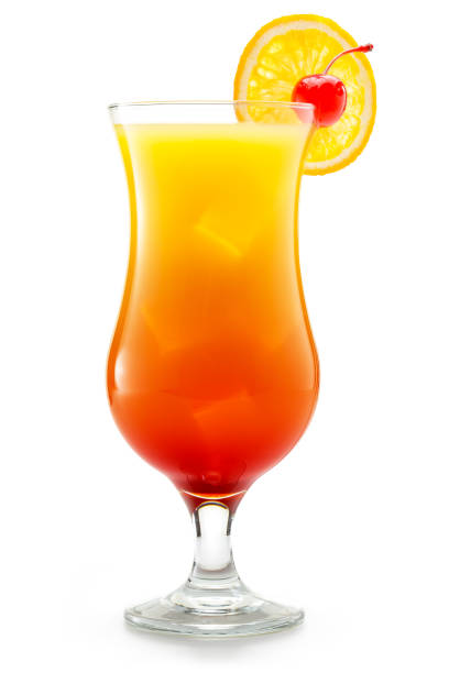 tequila sunrise cocktail on white background tequila sunrise glass garnished with orange and cherry on white background tropical cocktail stock pictures, royalty-free photos & images