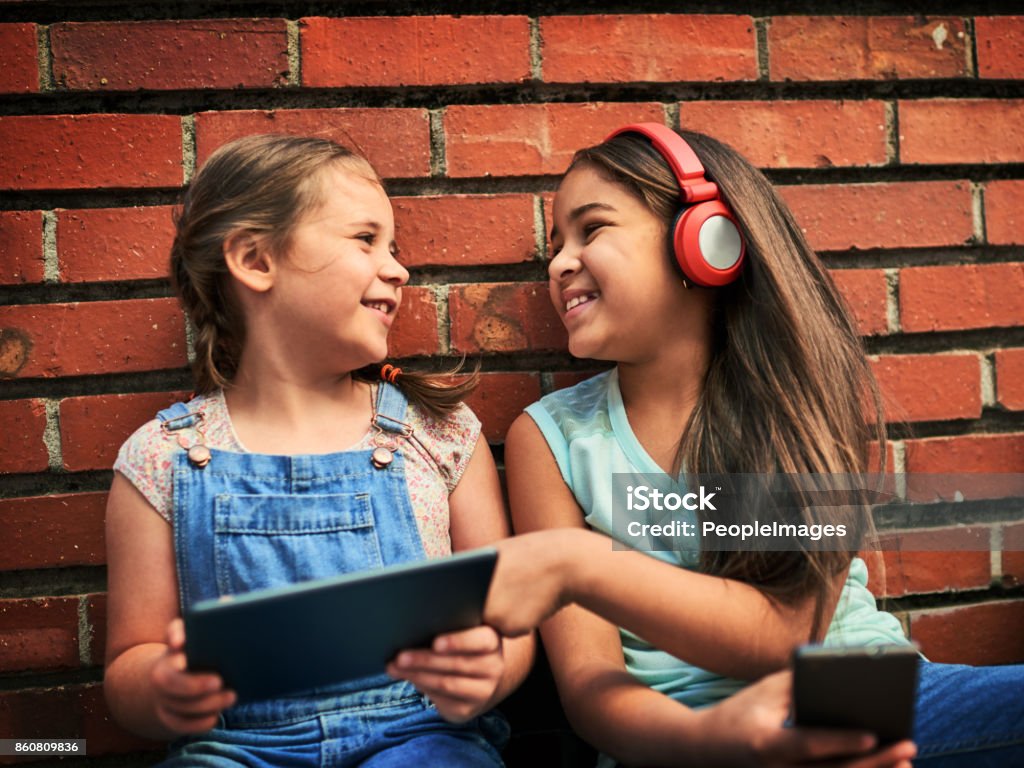 They Enjoy Watching Funny Videos Together Stock Photo - Download Image Now  - Adolescence, Arts Culture and Entertainment, Boys - iStock