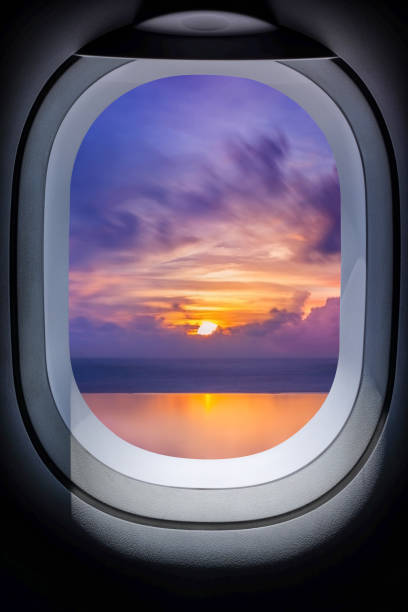 istock Beautiful sunset in seascape from aircraft window 860818714