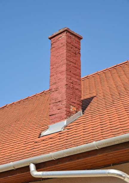 istock Roof of a house with smoke stack 860822226