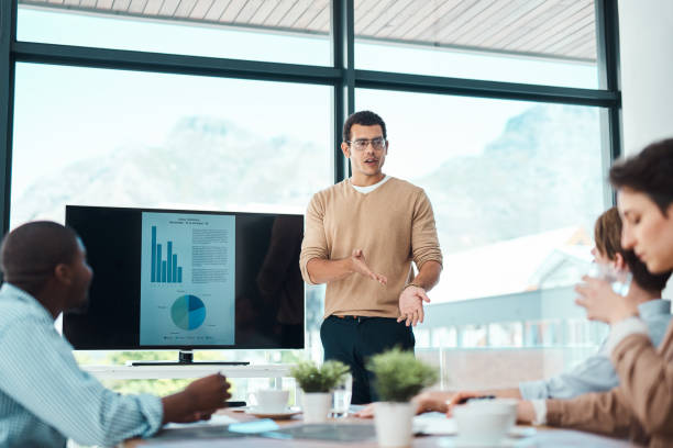 istock Sharing some business insights with his team 860822744