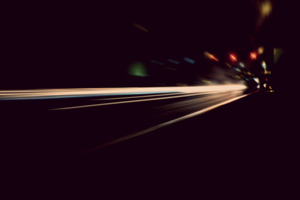 istock Blurry Illumination and night lights, car traffic motion blur the speed and dynamics 860825762