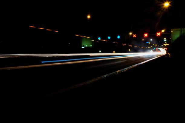 istock Blurry Illumination and night lights, car traffic motion blur the speed and dynamics 860825764