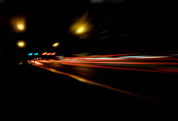 istock Blurry Illumination and night lights, car traffic motion blur the speed and dynamics 860825822