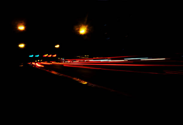 istock Blurry Illumination and night lights, car traffic motion blur the speed and dynamics 860825826