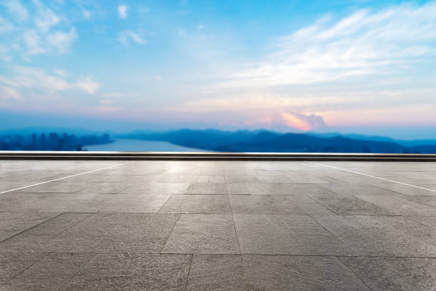 istock empty marble floor with modern city near long river 860830374