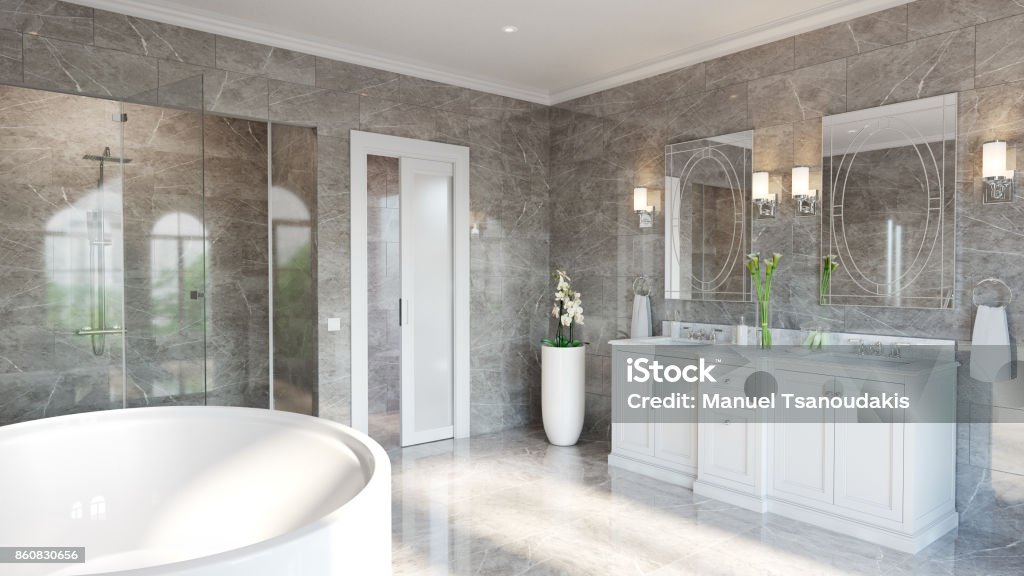 Luxury Ensuite for Master Bedroom Classical double vanity, oval spa bath, recessed double shower with porcelain floor and wall tiling throughout. Porcelain Stock Photo