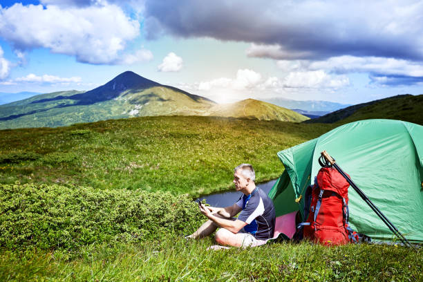 istock Hiking in the mountains in the summer with a backpack. 860833822