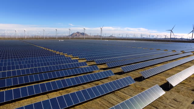 Solar panels and wind turbines, renewable energy