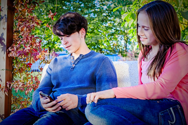 istock Teenagers playing with smartphone 860845236