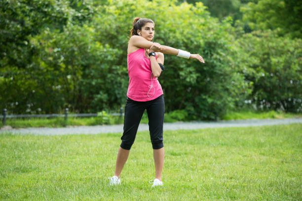 istock Young Woman Stretching Her Hands 860847926