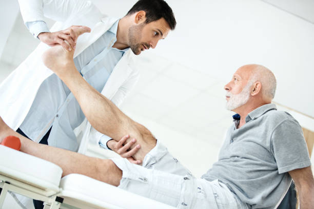 istock Senior man having medical exam. 860852524