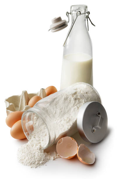 istock Baking: Flour, Eggs and Milk Isolated on White Background 860854126
