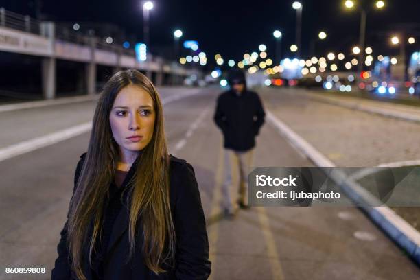 Shes Got A Bad Feeling Stock Photo - Download Image Now - Women, Street, Harassment