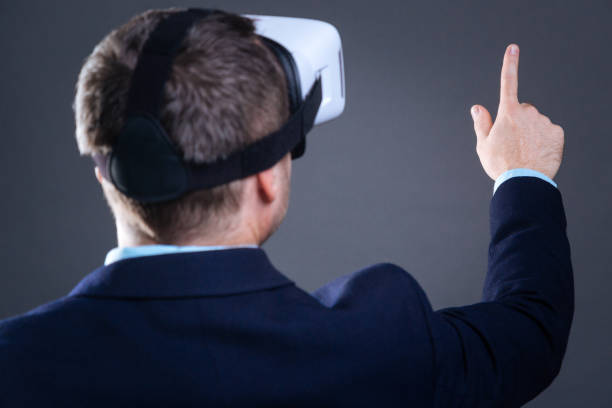 istock Attractive handsome businessman looking at the sensory screen 860864178
