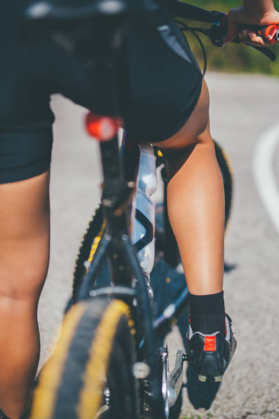 istock Sports girl with a bicycle 860873016