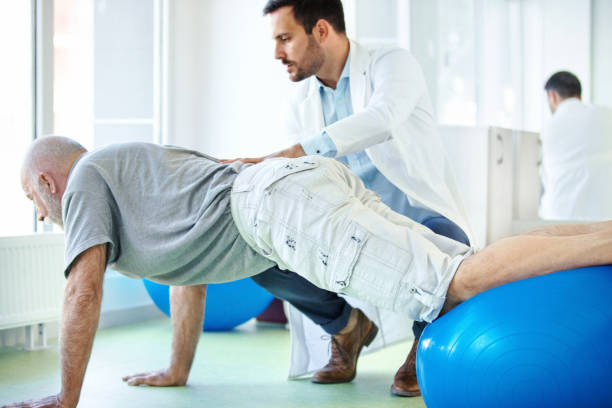 istock Senior man in physical rehab. 860880054