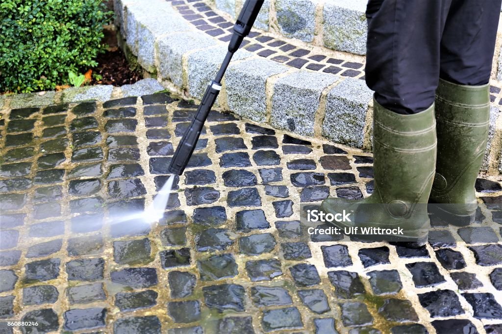 An Image of walkway cleaning - high pressure cleaner Washing Stock Photo