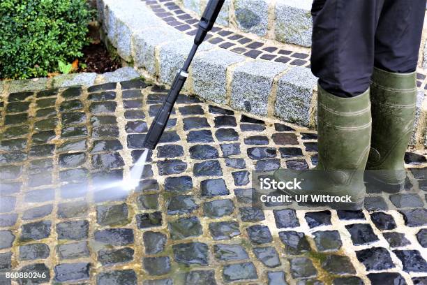 An Image Of Walkway Cleaning High Pressure Cleaner Stock Photo - Download Image Now