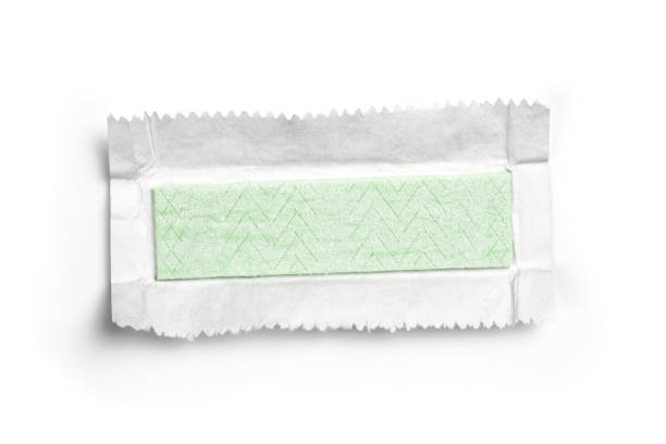 Chewing gum plate wrapped in foil isolated on white background