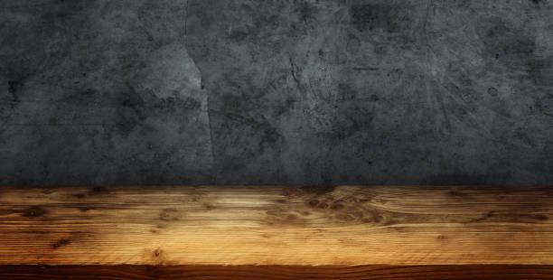 istock Gray concrete wall with red hearts 860883950
