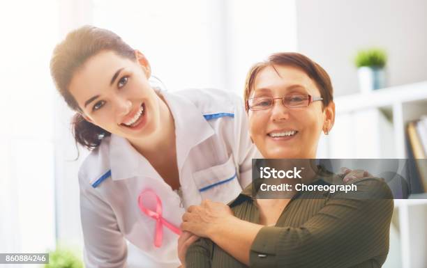 Patient Listening To Doctor Stock Photo - Download Image Now - Breast, Film and Television Screening, Women
