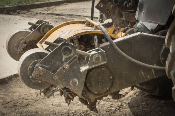 istock Saw for cutting asphalt mounted on a tractor. Asphalt cutting machine 860888818