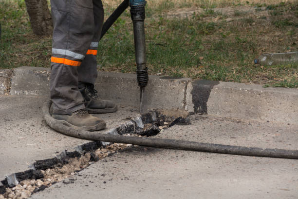 istock Road repairing works with jackhammer 860888972