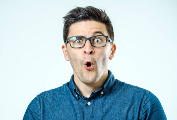 istock Caucasian man with surprised expression. Isolated on gray background 860892096