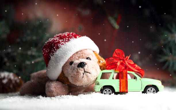 istock decorative New Year toy dog and small car 860898722