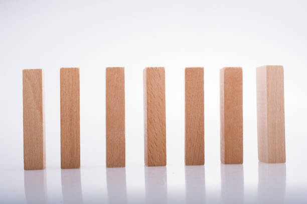 istock Wooden domino blocks on white background 860899076