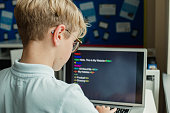 Male Student Learning Coding In School