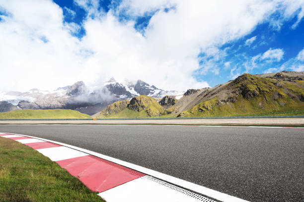 istock empty asphalt road with beautiful snow mountain 860907740