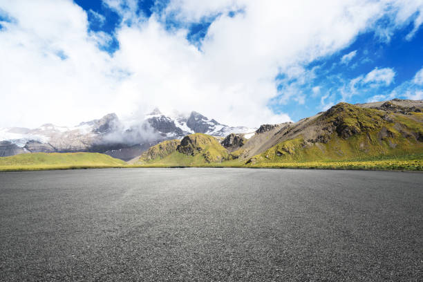 istock empty asphalt road with beautiful snow mountain 860911860