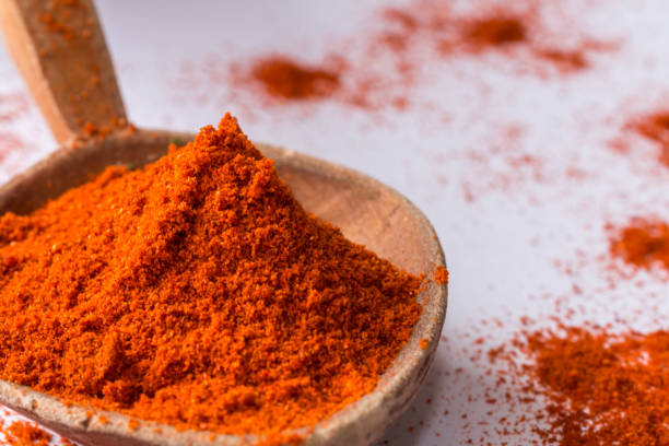 istock red paprika powder close-up on white 860926990