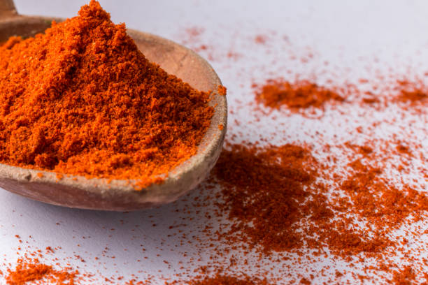 istock red paprika powder close-up on white 860926996
