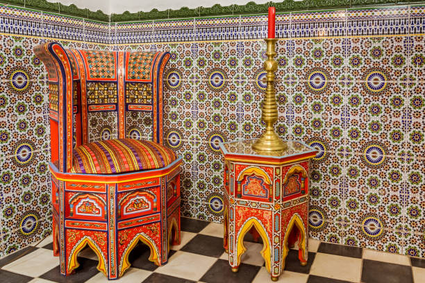 Traditional moroccan chair and table on a zellige background