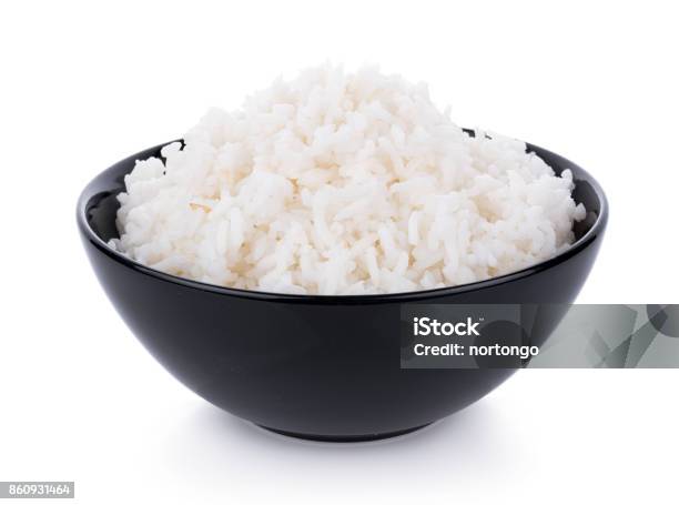 Rice In A Bowl On A White Background Stock Photo - Download Image Now - Rice - Food Staple, Bowl, Cut Out