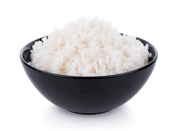 Rice in a bowl on a white background