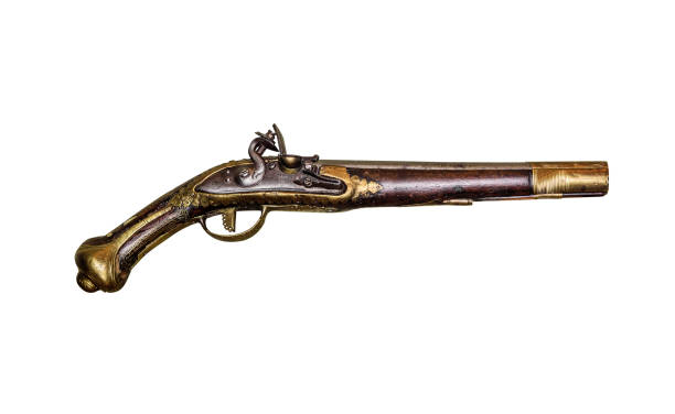 18 世紀の火器ピストルや木製のハンドルと銅縁マスケット銃のクローズ