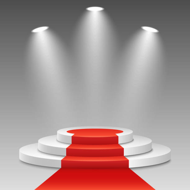 istock White podium with a red carpet on a transparent background. The winner is in first place. Bright white light from searchlights. Light pedestal. Festive event. Vector illustration 860936192
