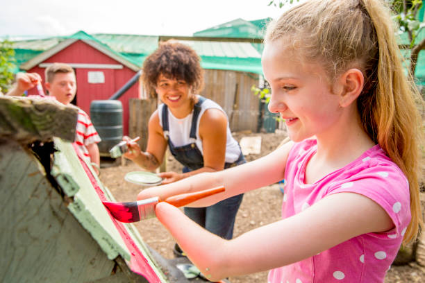 Painting a Chicken Coop at the Farm