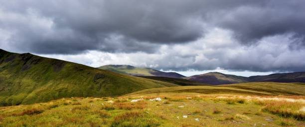istock Sunlight over the Northern Fells 860940482