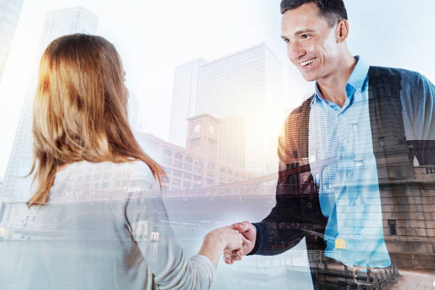 istock Pleasant man getting acquainted with his new coworker 860951268