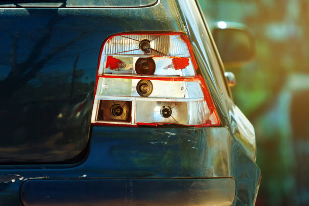 Close up of a broken car rear headlight after an accident