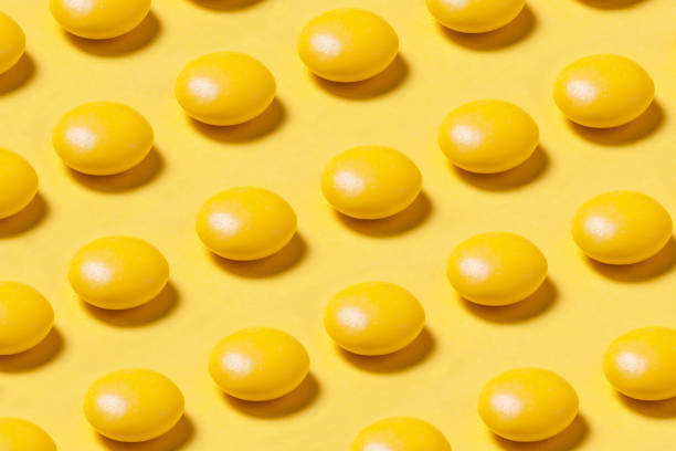 istock Yellow Candy on  yellow background 860958860