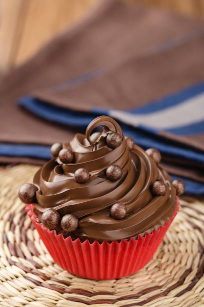 istock Homemade chocolate cupcake with chocolate sprinkles 860973264