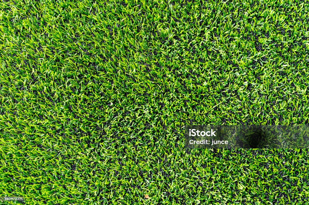 Plastic grass with rubber floor for Indoor sport courtyard Abstract Stock Photo