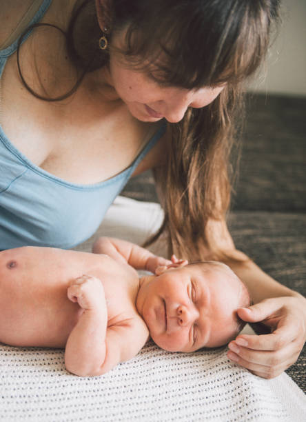 istock Newborn baby and mom 860980774